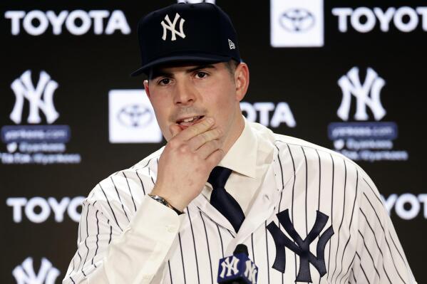 Carlos Rod n newly shaved puts on Yankees pinstripes AP News